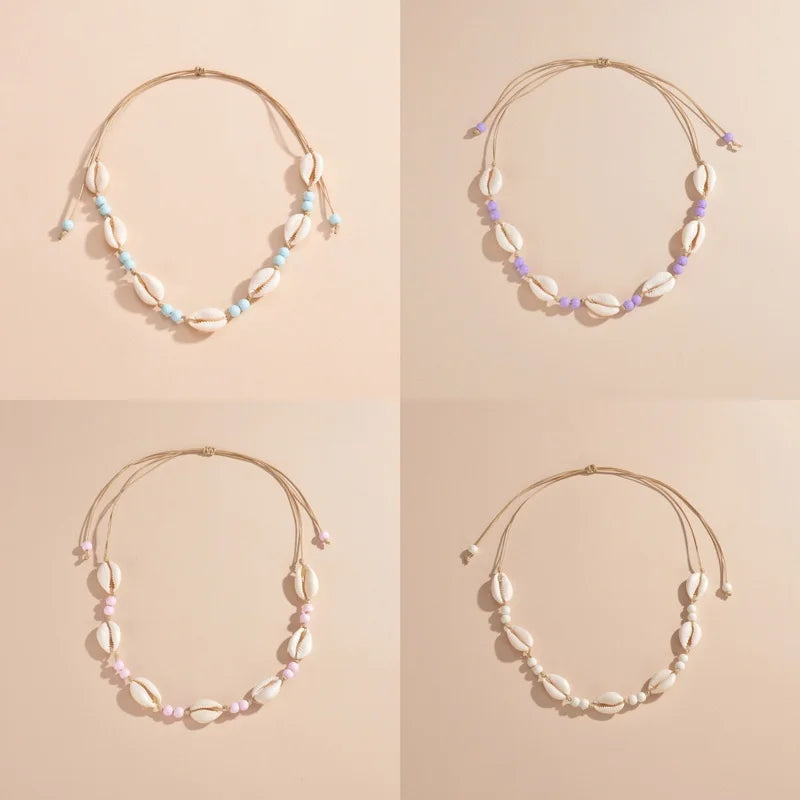 Ras du cou tressé avec perles de coquillages