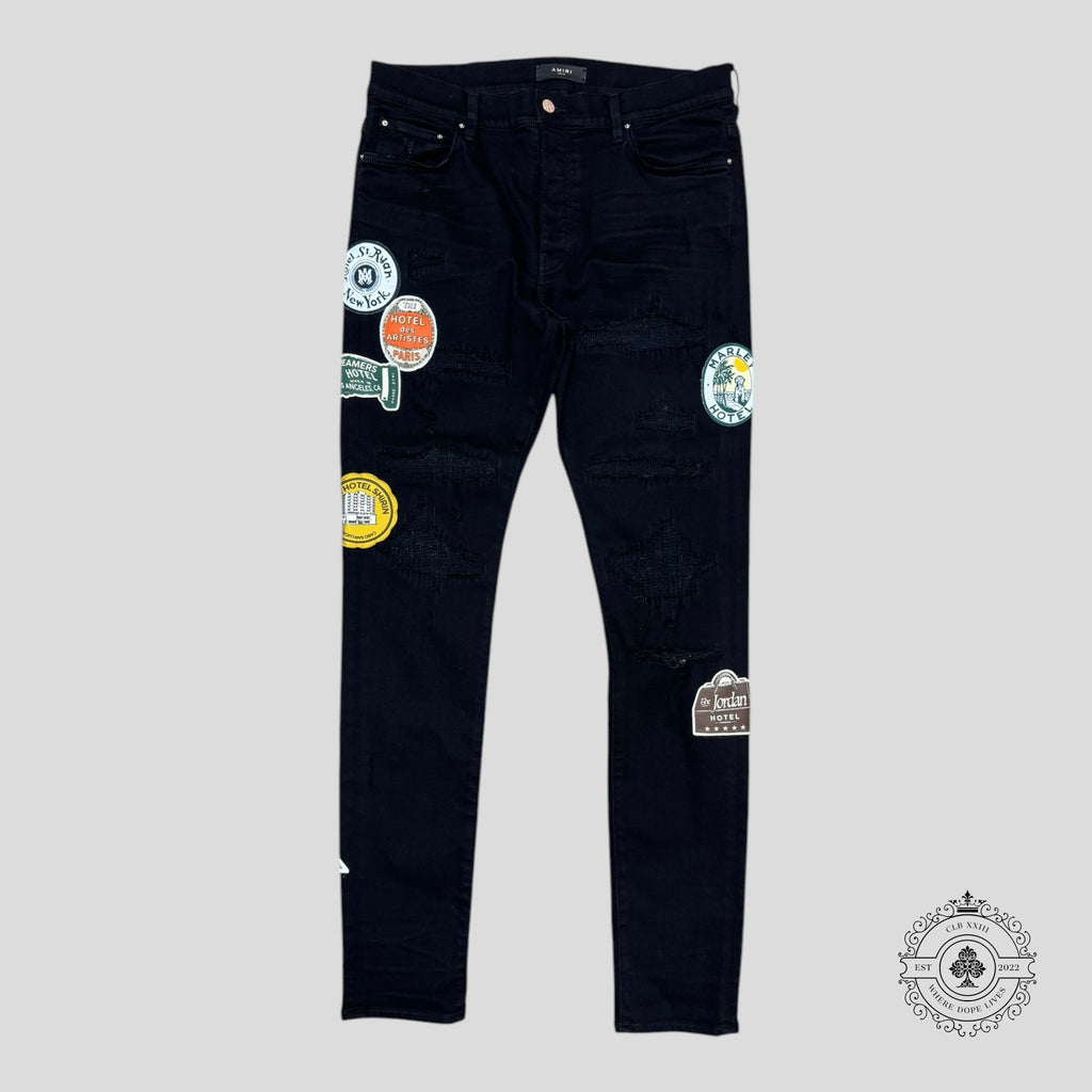 Amiri Travel Patch Repair Jeans in Black