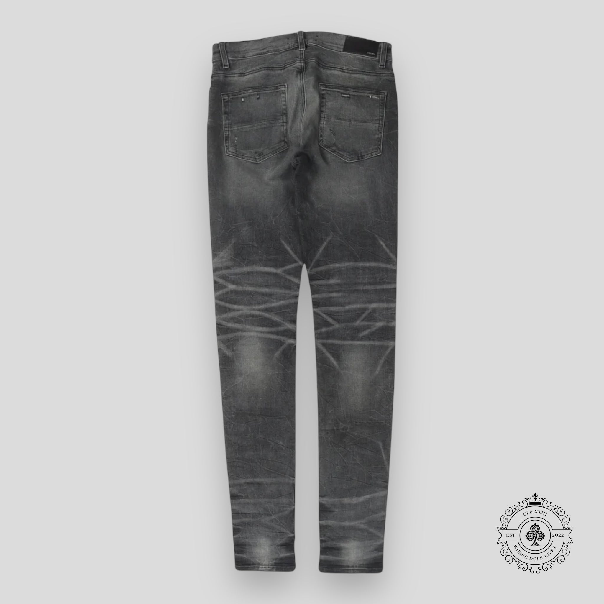 Amiri Faded Denim Jeans in Grey