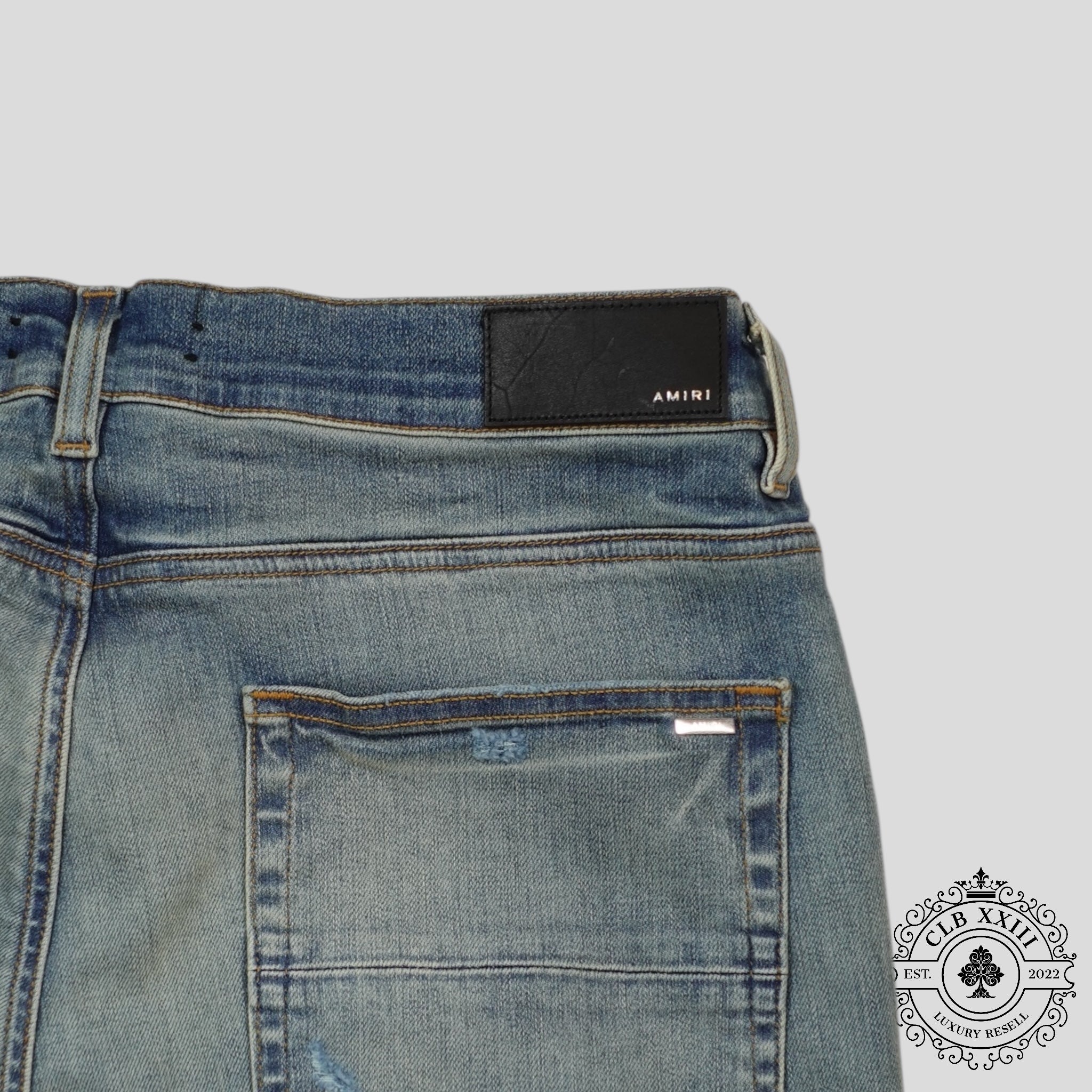 Amiri MX1 Camo Patch Jeans in Clay Indigo