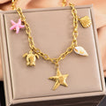 Collier en or étoile de mer tortue conque