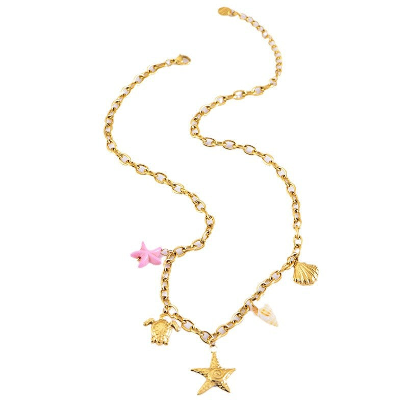 Collier en or étoile de mer tortue conque