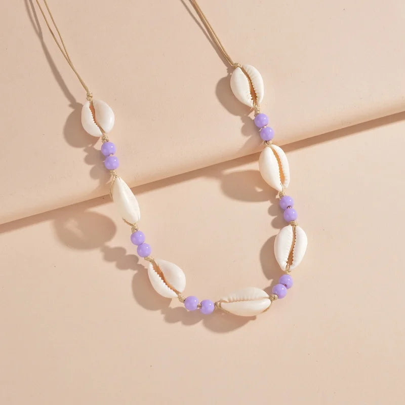 Ras du cou tressé avec perles de coquillages