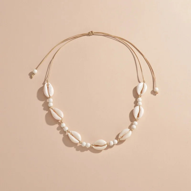 Ras du cou tressé avec perles de coquillages