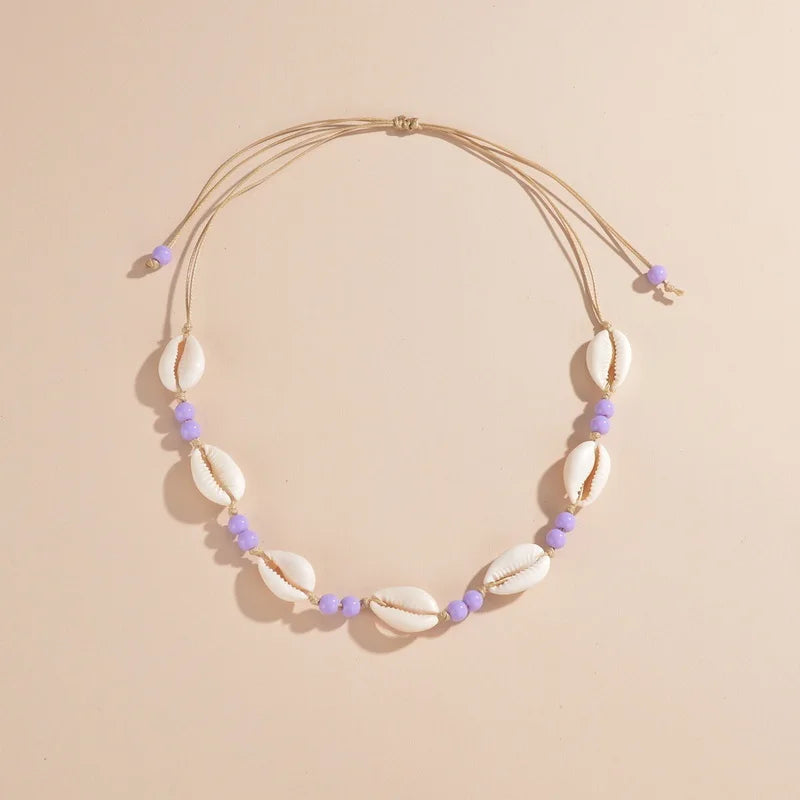 Ras du cou tressé avec perles de coquillages