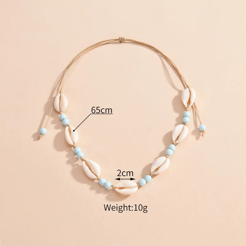 Ras du cou tressé avec perles de coquillages