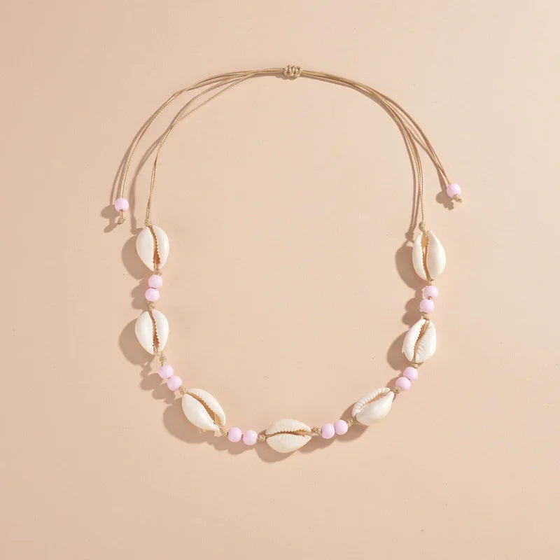 Ras du cou tressé avec perles de coquillages